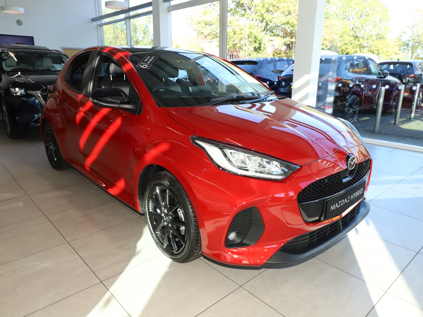 Main listing image - Mazda 2 Hybrid