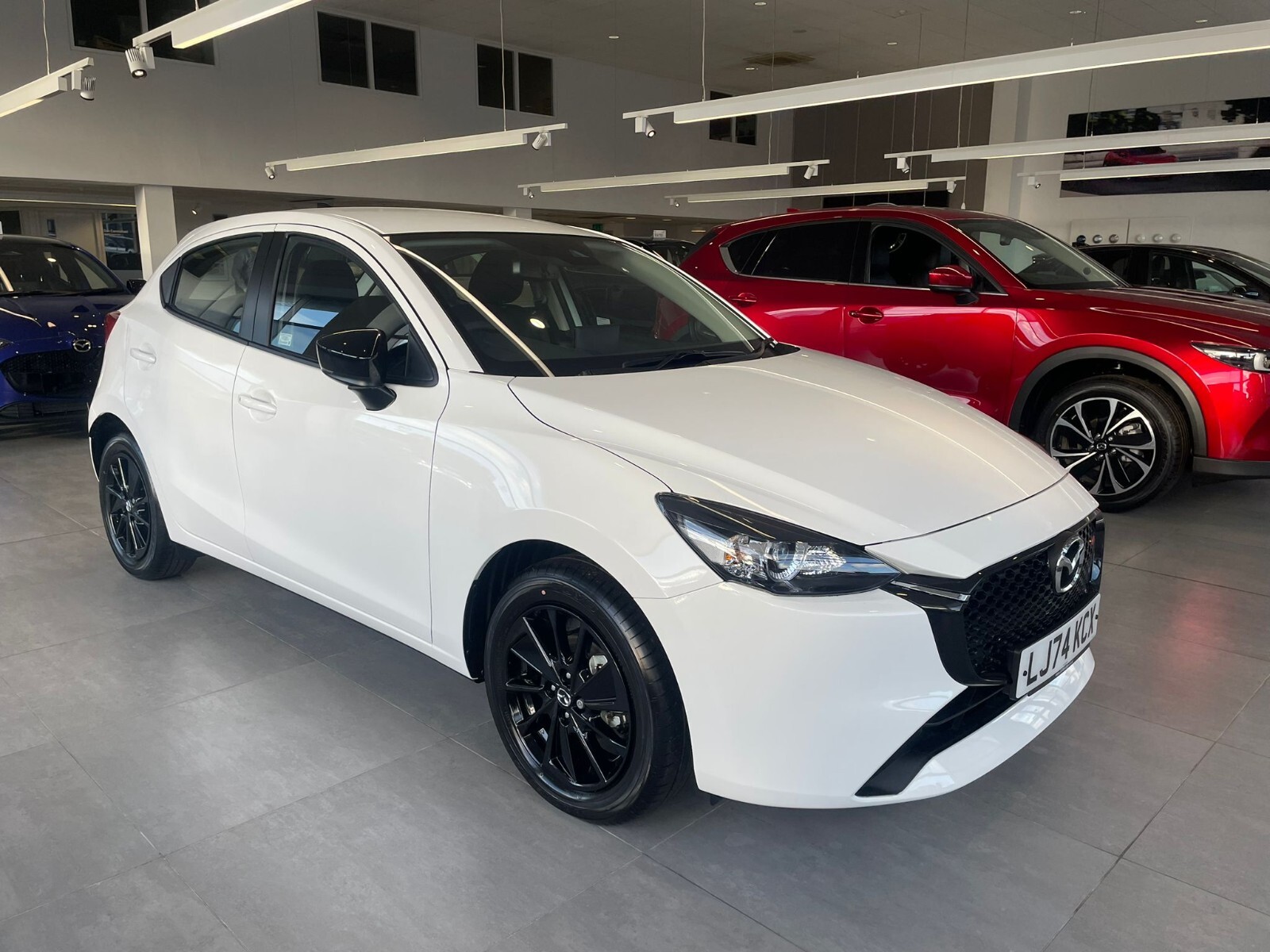 Main listing image - Mazda 2